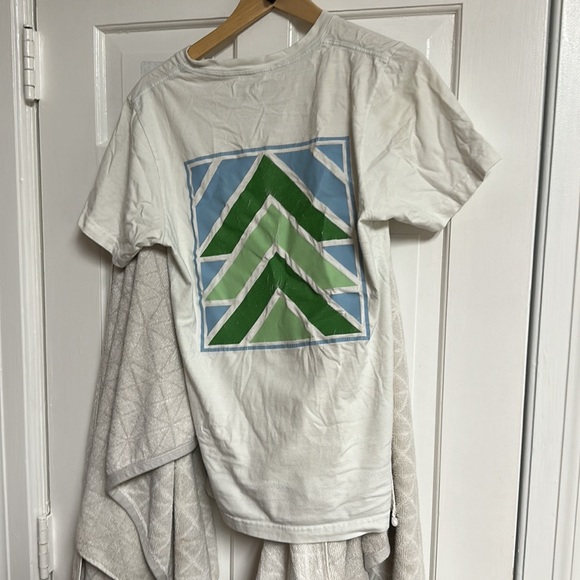 The brand is Russell and the size is small and is white with green and blue. - Picture 2 of 6
